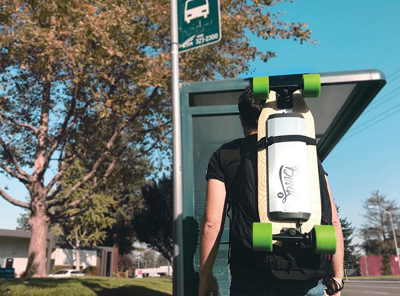 Blink E-Skateboard carried