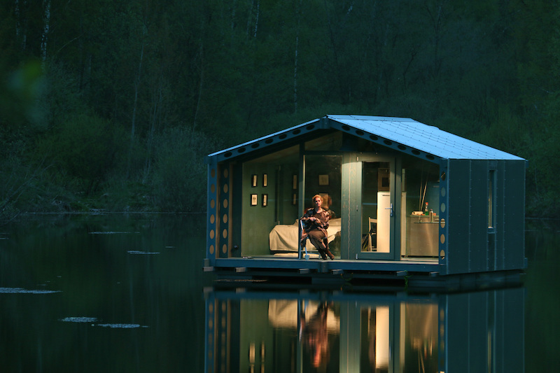 DD16 Floating Cabin - BIO Architects - with a woman inside