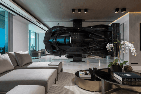 A full-size replica of a Pagani Zonda HP Barchetta being used as a room divider in racecar driver Pablo Pérez Companc's apartment.