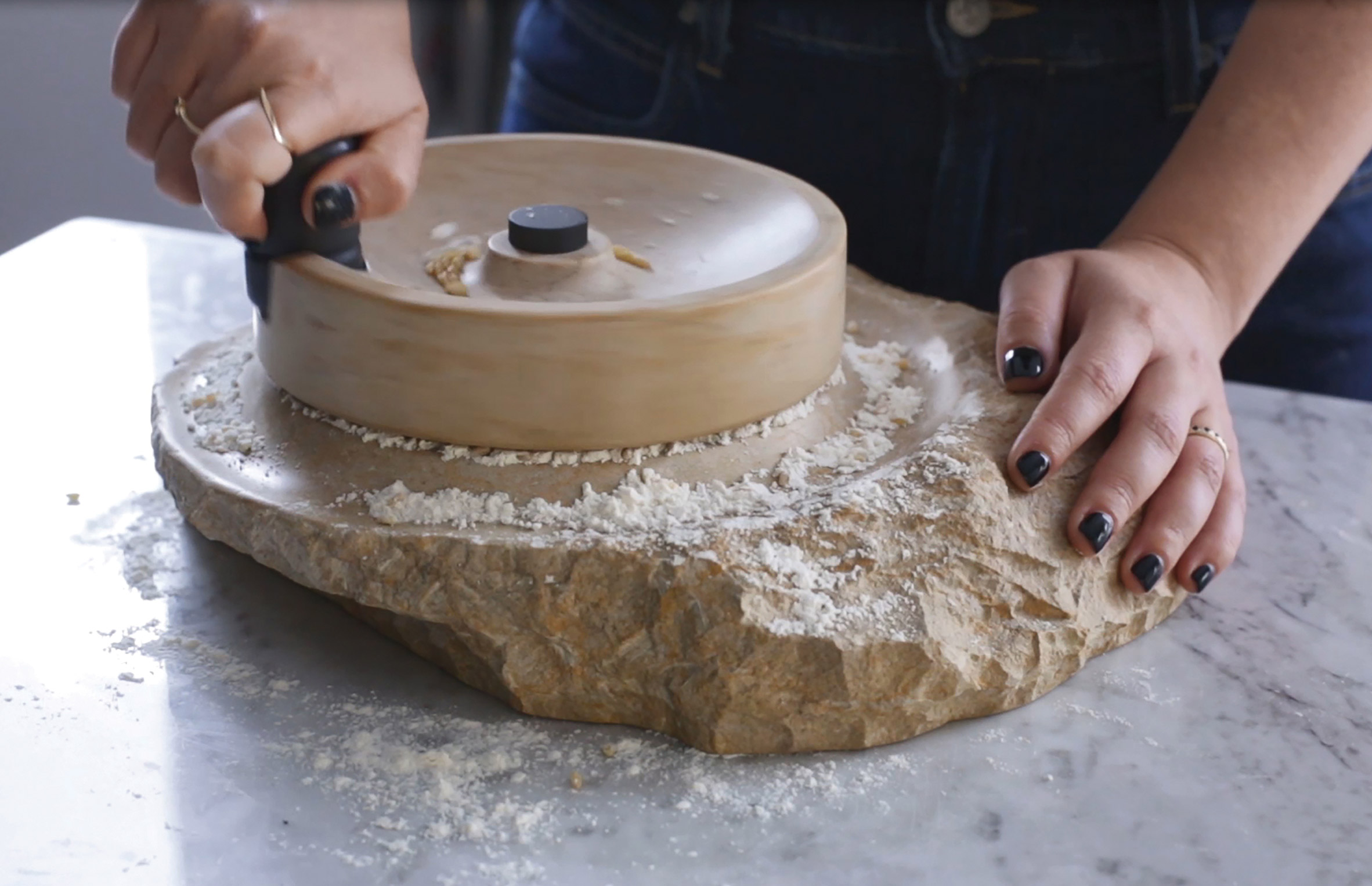 The millstone featured in Amalia Shem Tov's "Roots" cooking utensil collection.