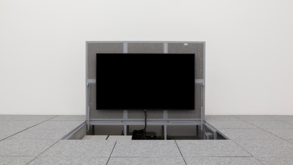 A flat-screen TV hidden underneath the floor panels in the Centre Pompidou