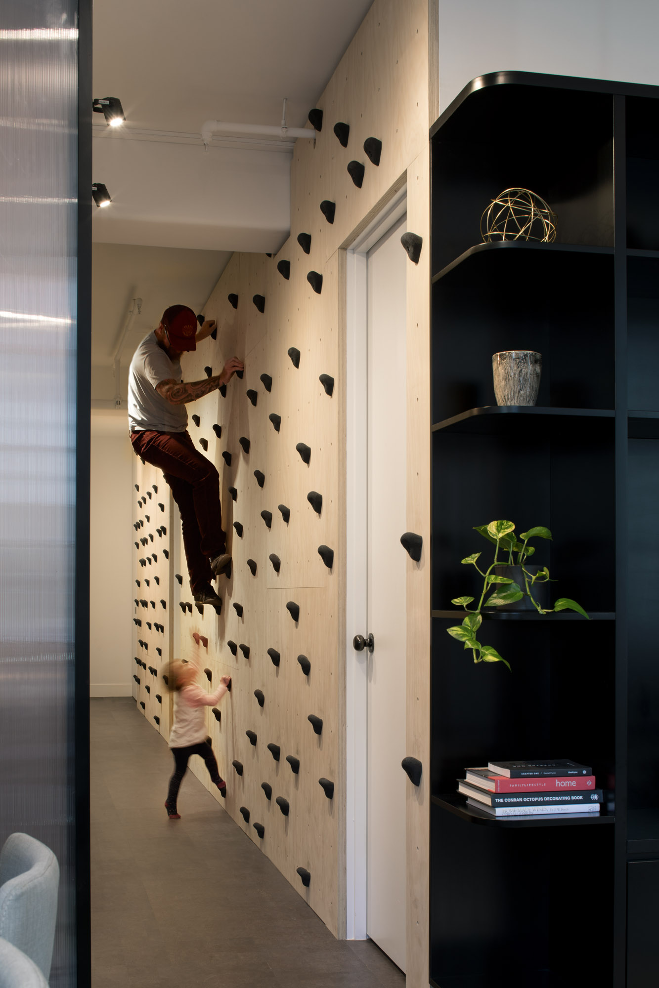 A residential climbing wall inside a Melbourne apartment. 