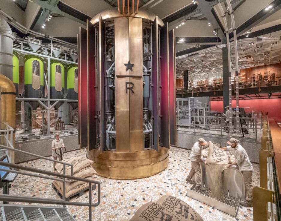 The 22-foot-tall bronze coffee “kettle” inside the new Starbucks Roastery in Milan