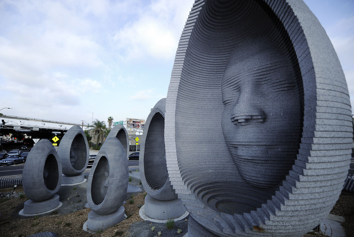 "Faces of Elysian Valley," a nine-piece sculptural monument in the center of a new LA monument.