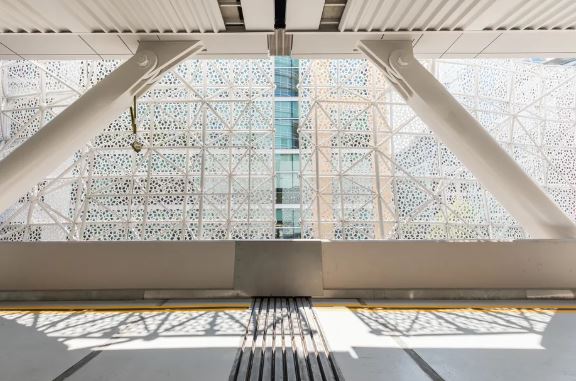 An interior view of the Salesforce Transit Center's perforated aluminum facade.