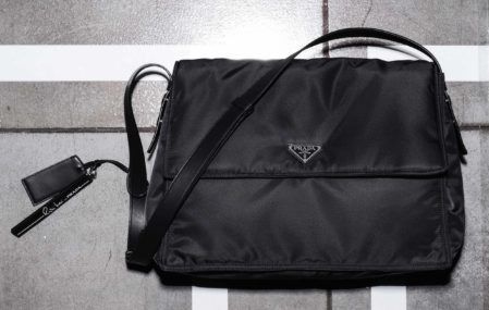 A black nylon Prada bag.