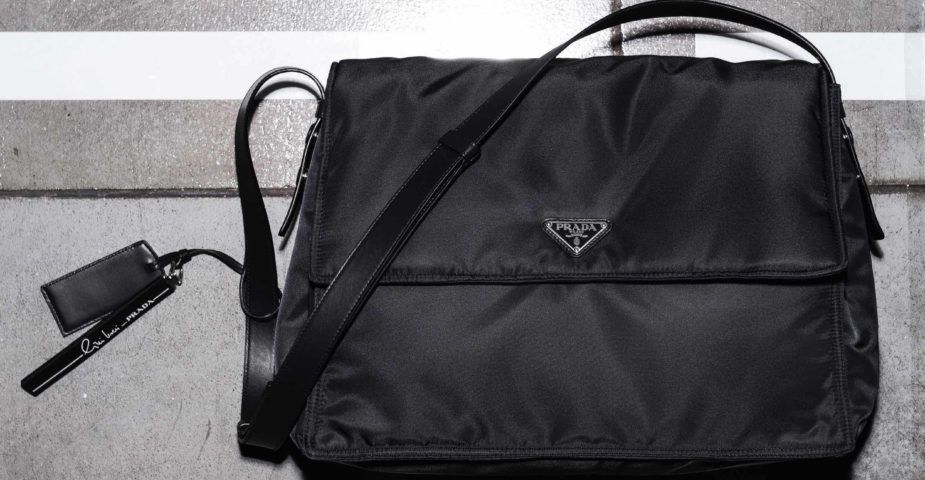 A black nylon Prada bag.