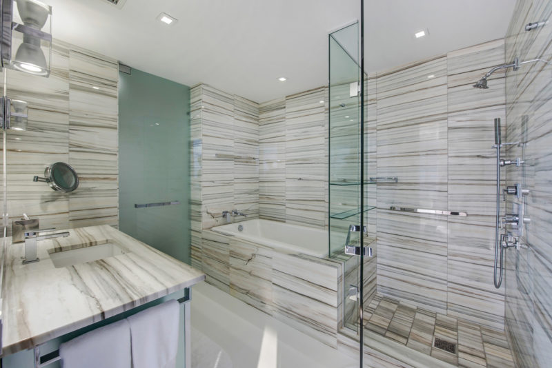 A bathtub and shower inside the late Zaha Hadid's self-designed Miami beach house.