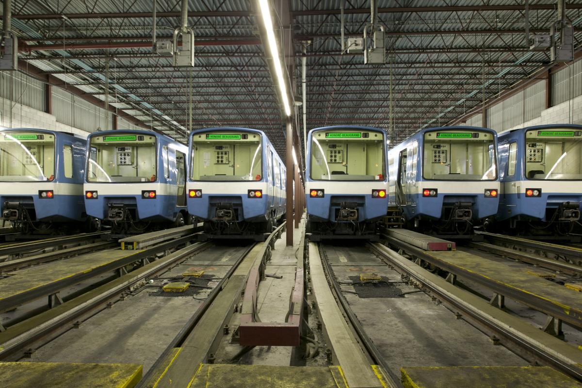 Six of Montreal's out-of-use MR-63 subway cars sitting on the tracks.