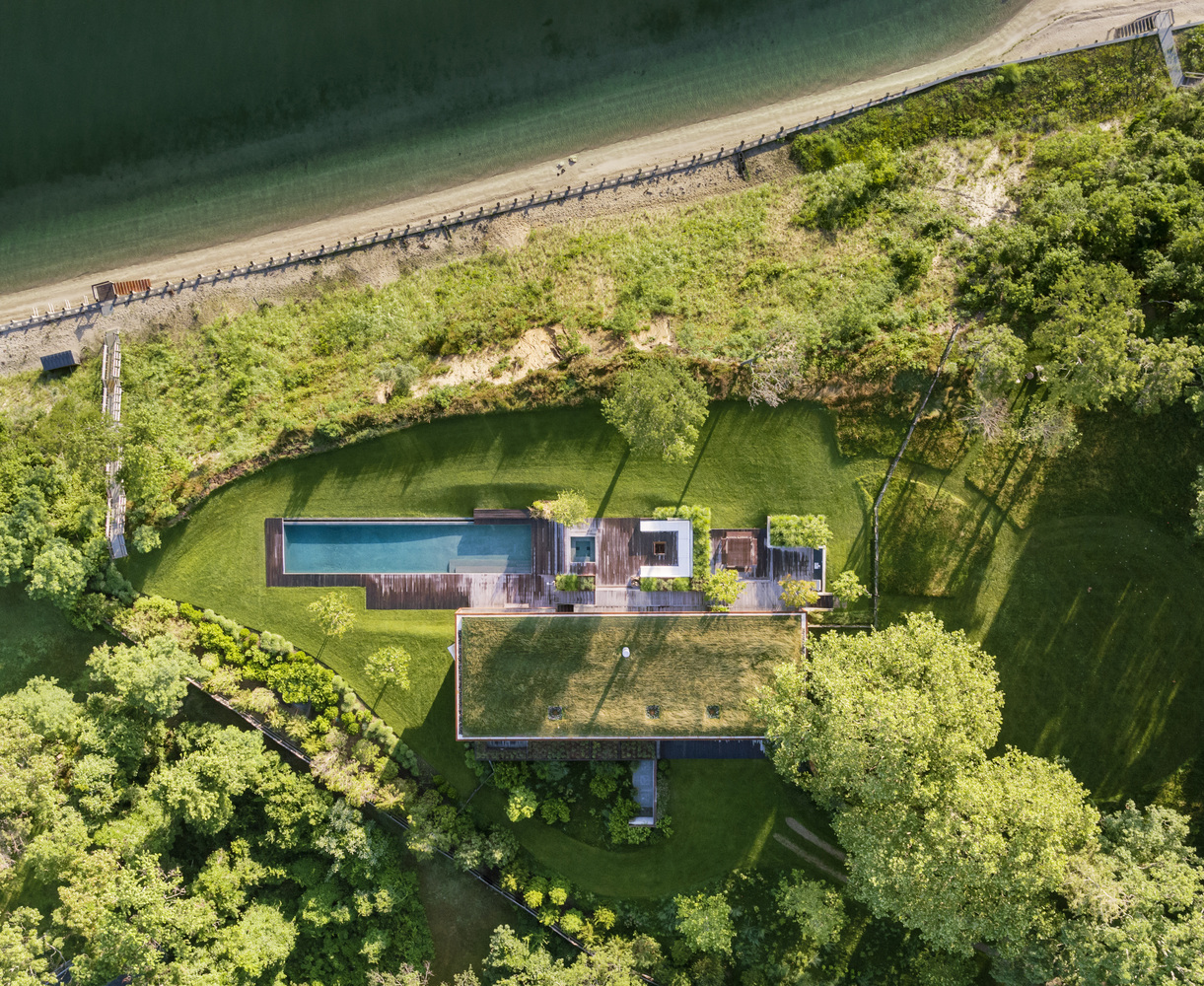 Aerial view of Peconic House, the new nature-inspired Hamptons home by Mapos. 