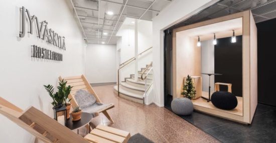 The reception area of the new Forenom Hostel Jyväskylä. Designed by Studio Puisto Architects.