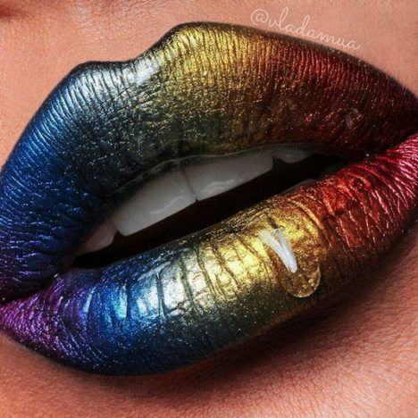 An example of Vlada Haggerty's Lip Art, featuring a rainbow-colored lipstick design.