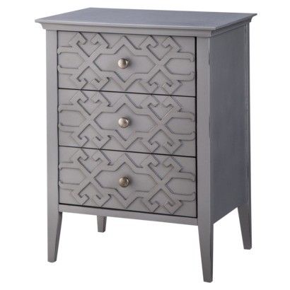 A low, grey Threshold dresser in front of a white background. 