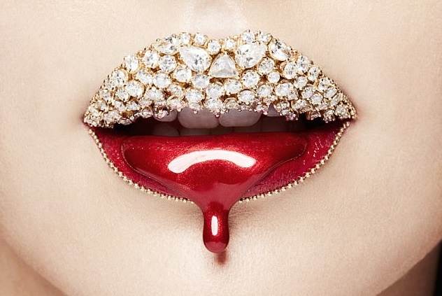 An example of Vlada Haggerty's Lip Art, featuring a diamond-studded lipstick design.