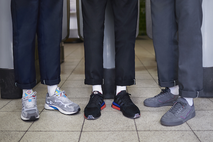 Three people wearing the sneakers that comprise the Adidas Originals X TfL Collection.
