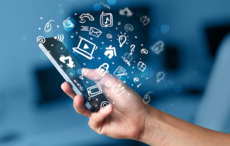 Smartphone with several app icons coming out of the screen.