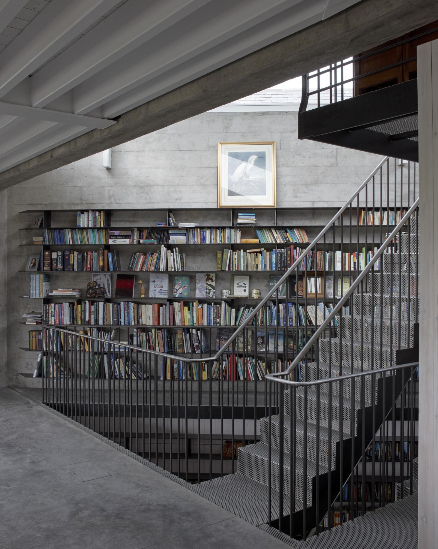 The expansive library inside the new Sartfell Retreat's center stairway.