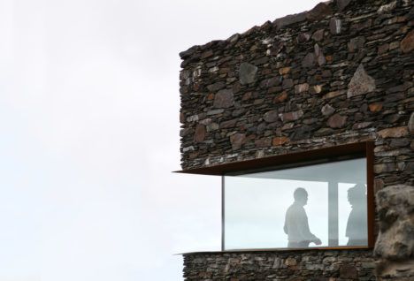 Exterior corner of the new Sartfell Retreat, with a strip of glazing visible in the middle.