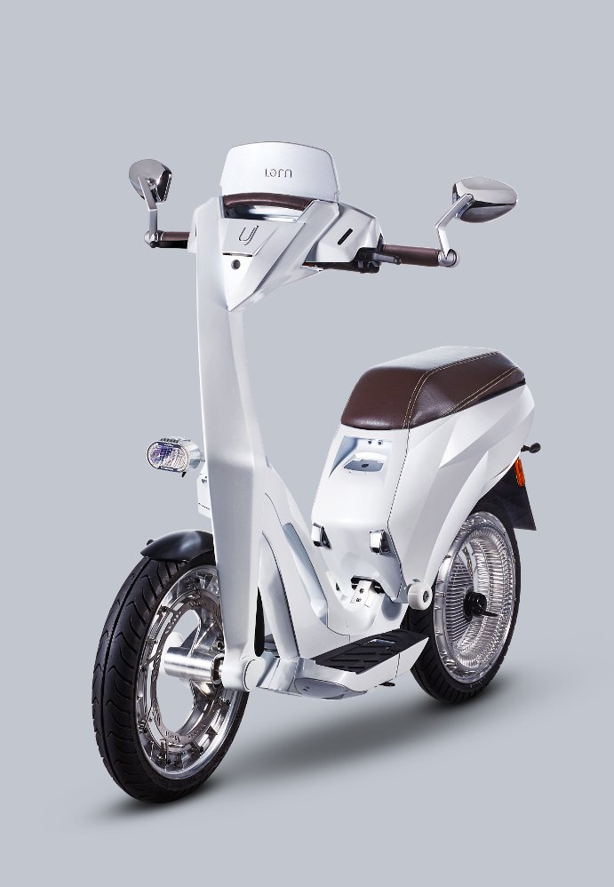 Frontal view of a white UJET scooter set against a gray background.