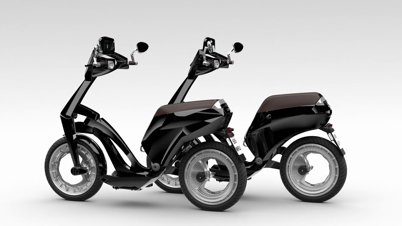 Two UJET electric scooters set against a white background.