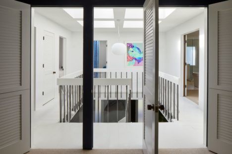 The upper floor of the Grawe family's renovated 1970s dream home., as seen through a doorway.