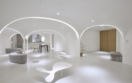 The minimal white interiors of the renovated Sunny Apartment.