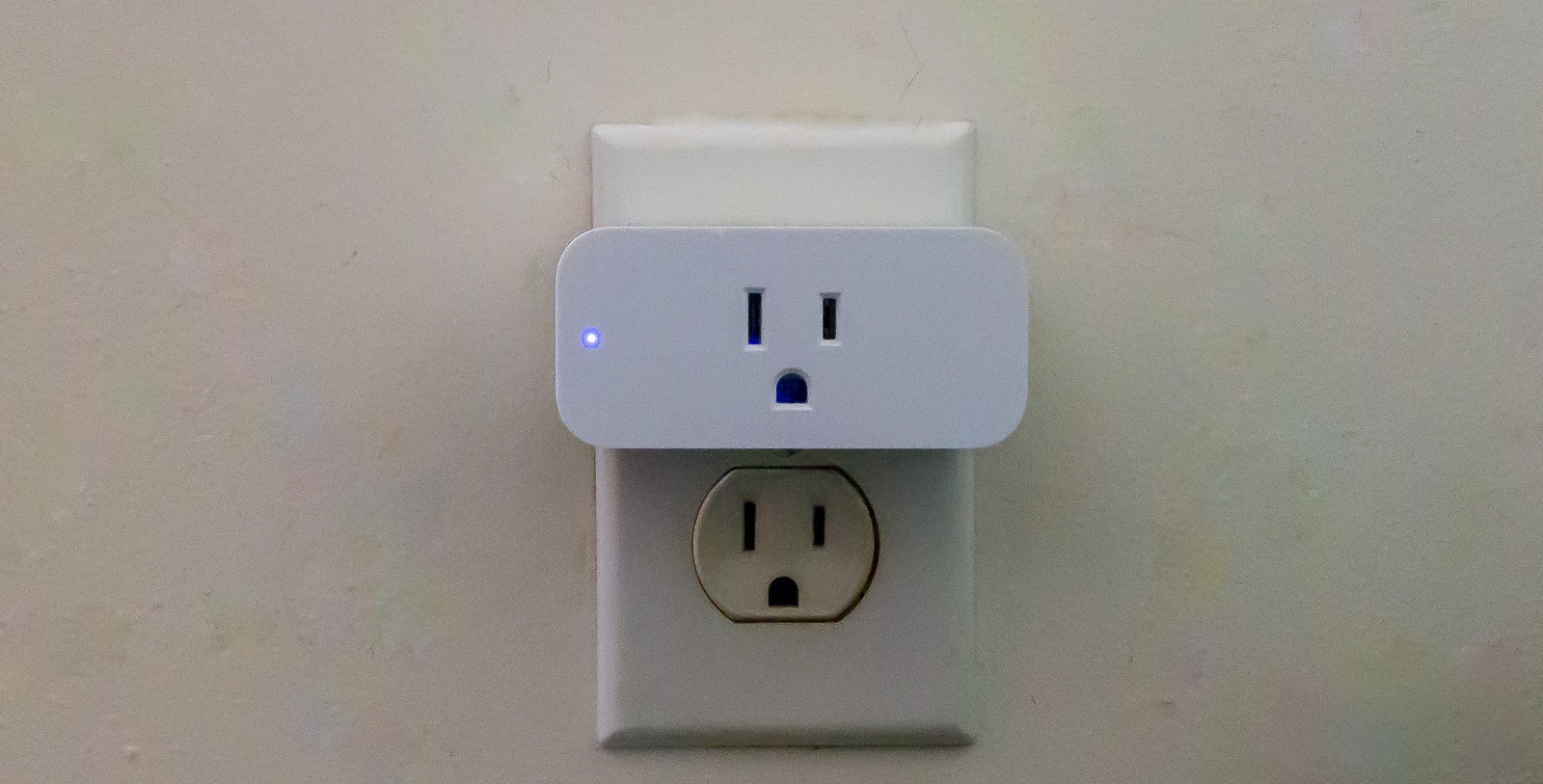 The Amazon Smart Plug plugged into a wall socket.