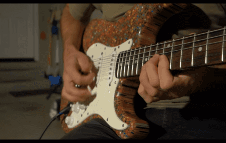The Custom Fender Stratocaster built by Burls Art. Made entirely out of colored pencils.