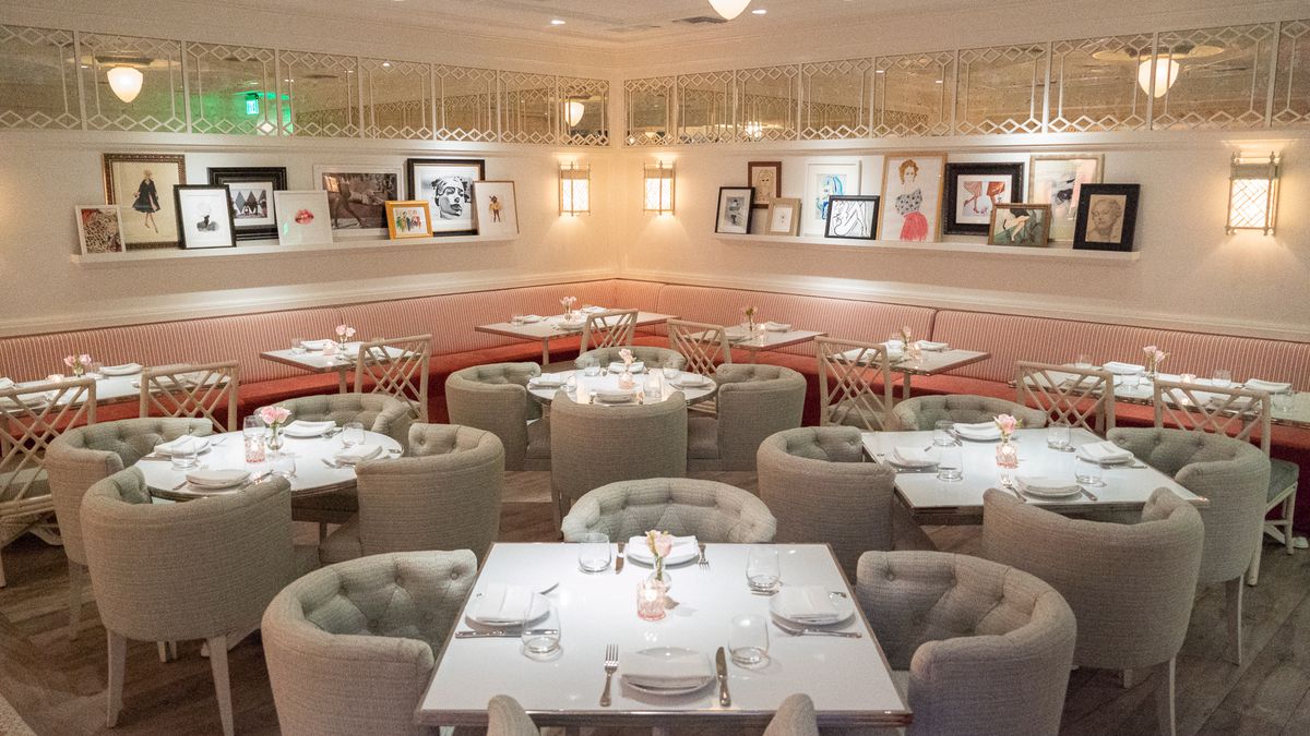 A pastel-pink dining area inside Pharrell Williams' new Swan Restaurant in Miami.