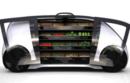 Side view of a Robomart self-driving grocery store on wheels.