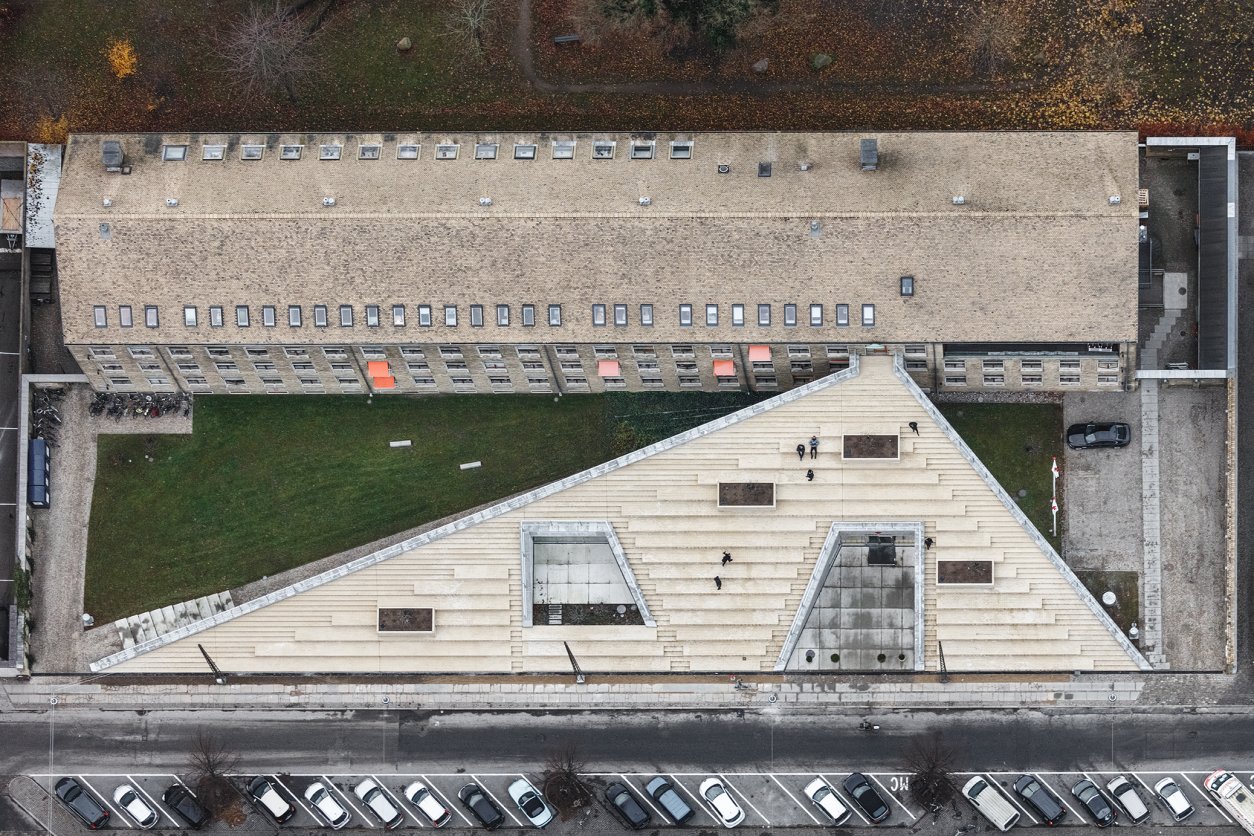 Aerial shot of the Red Cross Volunteer House's brick rooftop plaza. 