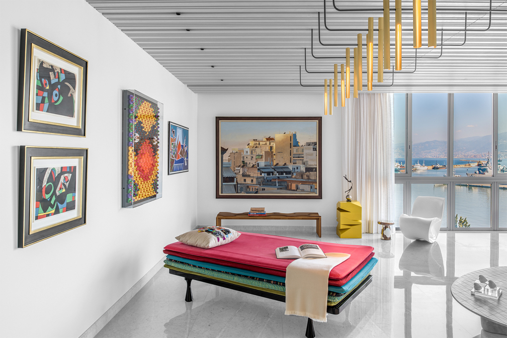 Awrtworks from various cultures adorn the walls of the "One Oak 3&4 B2" seaside apartment.