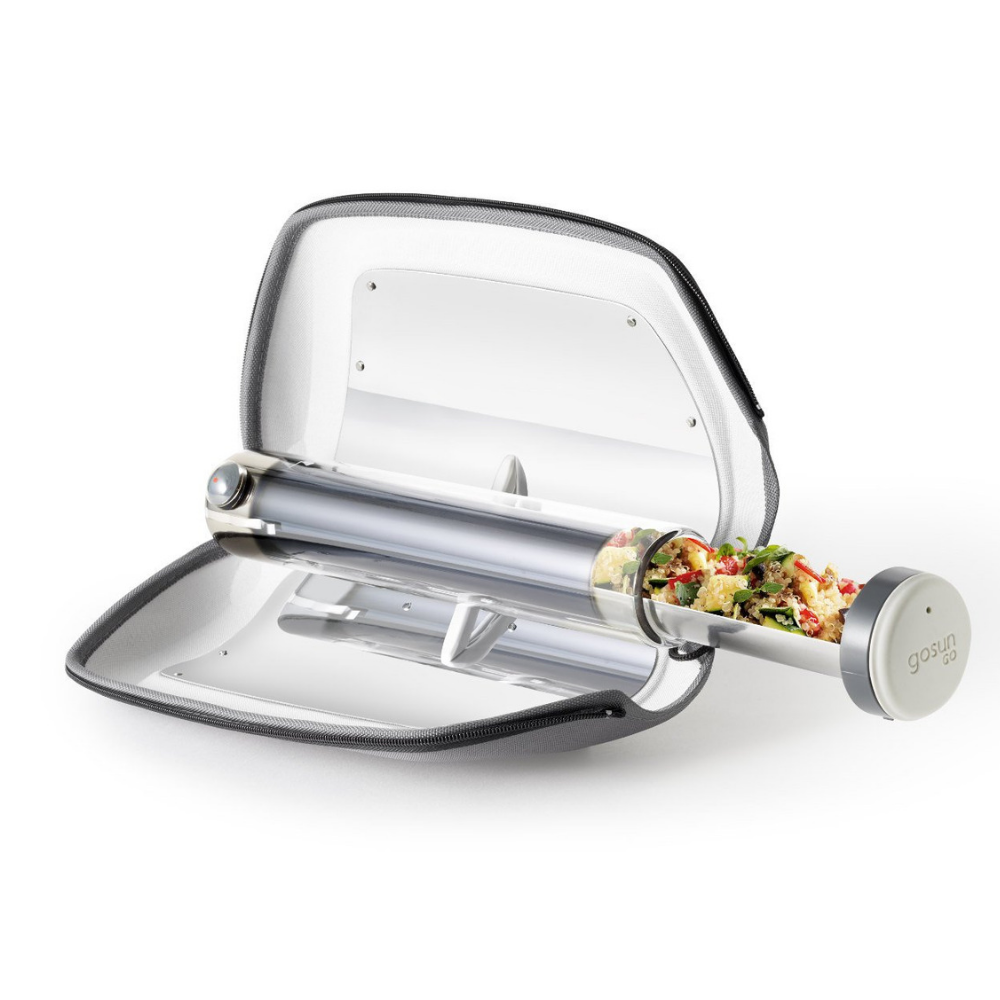 The GoSun Solar Solar Cooker, with a tube of fresh veggies about to go in. 