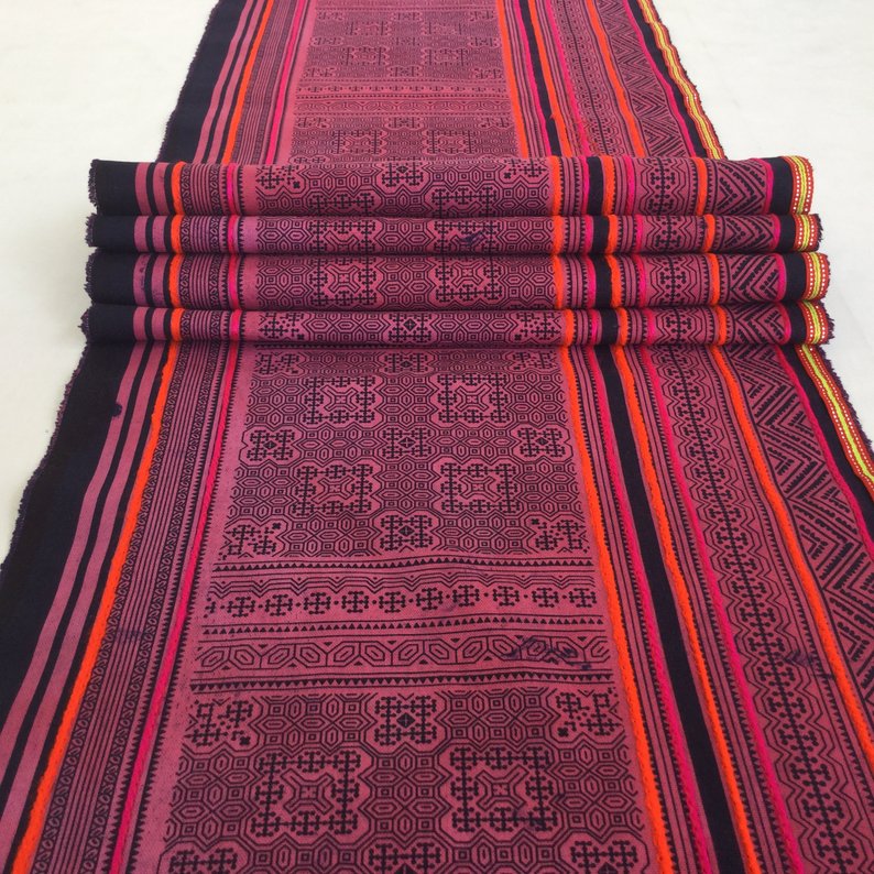 A decorative textile made by the people of Thailand's Hmong hill tribe.