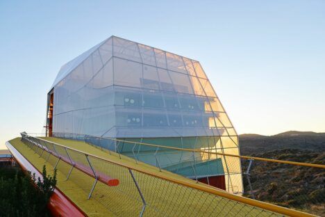 Exterior daytime shot of the translucent Plasencia Conference Center and Auditórium.