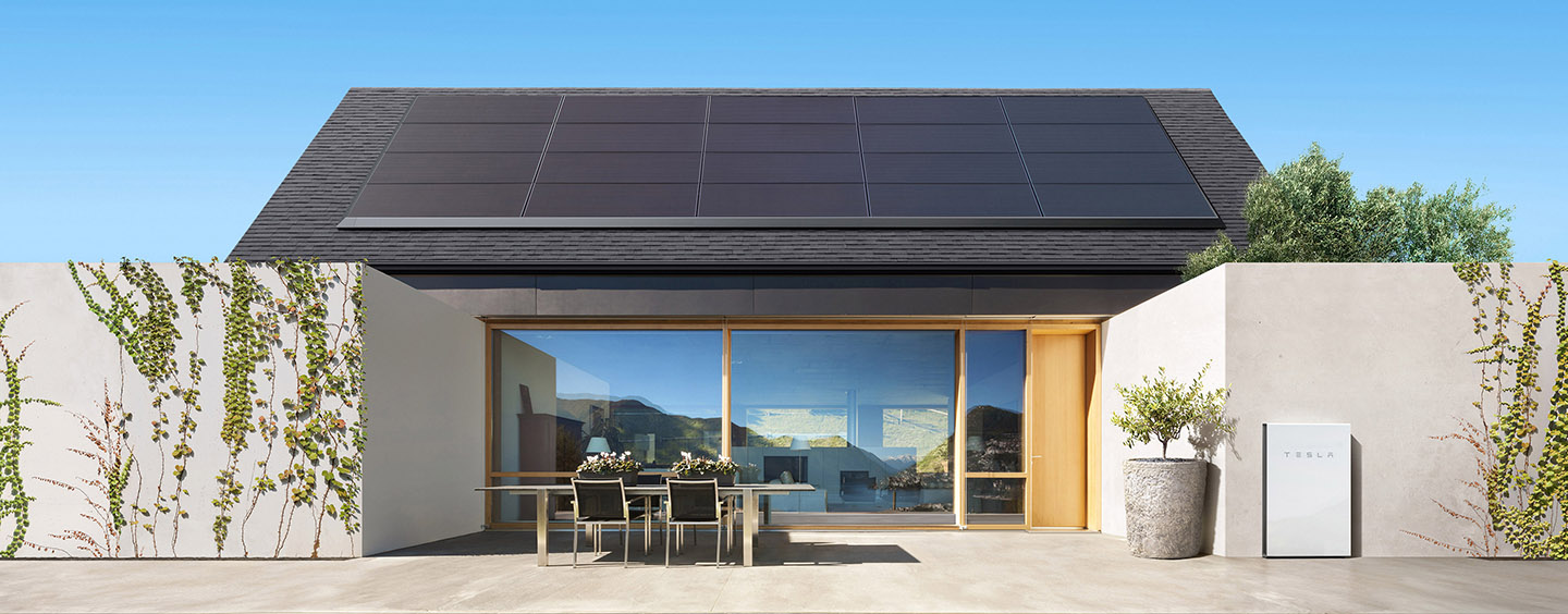 Tesla solar panels installed on the roof of a residential home.