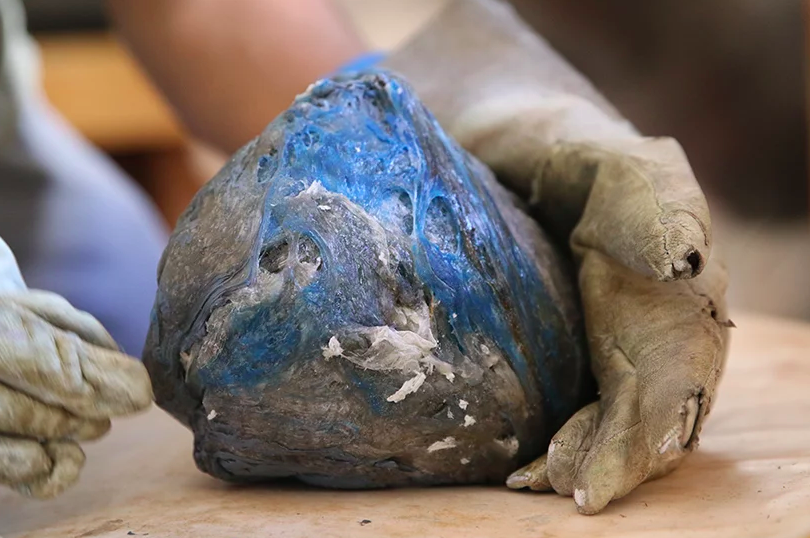 The melted ball of recycled plastic that goes into making each Gomi speaker.