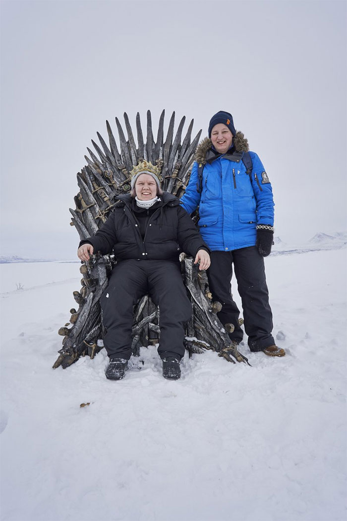 Game of Thrones fans pose with HBO's hidden "Throne of the North" in Sweden.