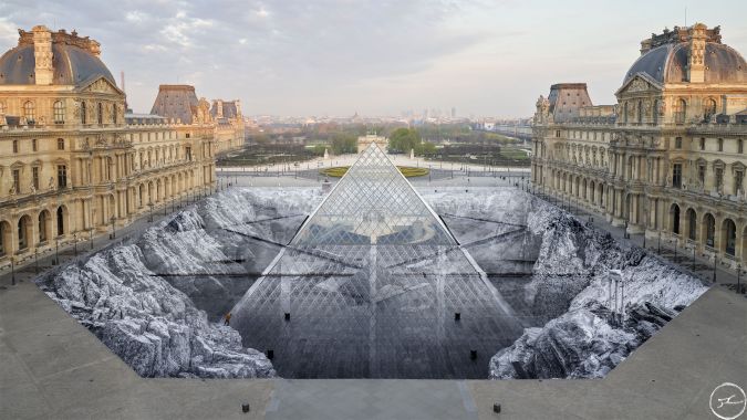The newest art installation from French artist JR, in which he "excavates" the ground all around the Louvre pyramid. 