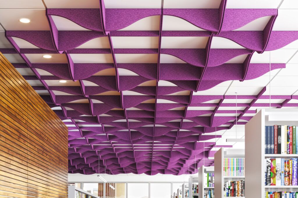 TURF Design's Switchblade ceiling system hanging over an office space. 