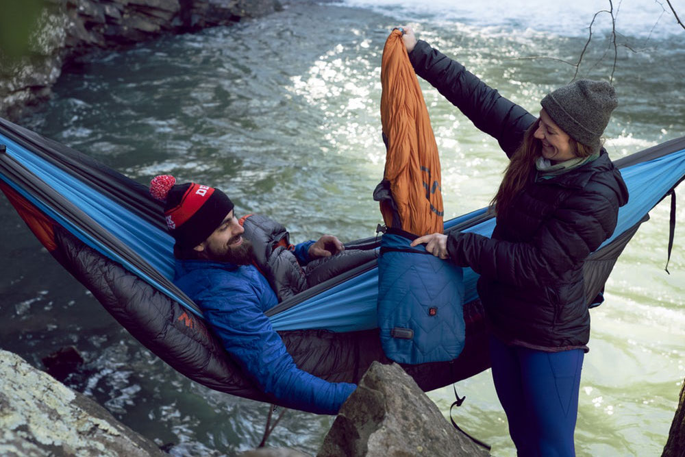 Camper uses Hot Pocket Stuff Sack to keep warm in his hammock.