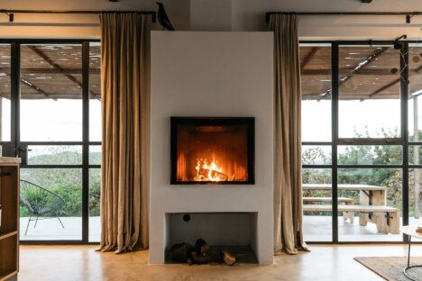 The Ibiza Campo Loft's sleek new living area and fireplace.