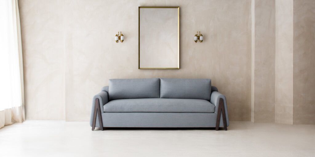 The Rainer Sofa, one of many luxurious chairs and couches featured in Dmitriy & Co's new spring-summer collection.