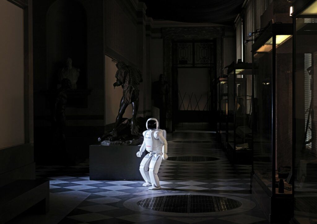 Stills from artist Vincent Fournier's "The Man Machine" photography series, featuring humanized depictions of robots.