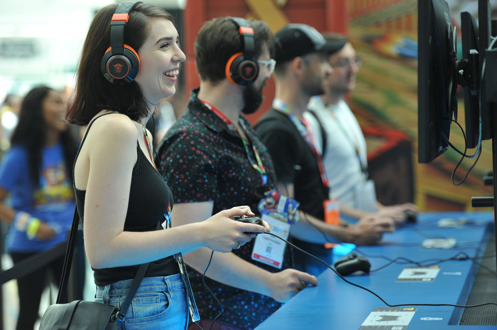 Young people trying out new video games at E3 2019 in Los Angeles, CA 
