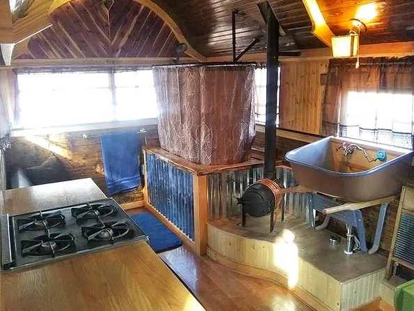 The kitchen and bath area inside the Griswald tiny home.