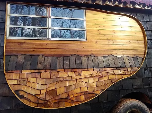 Close-up of the wooden detailing outside the Griswald tiny home.