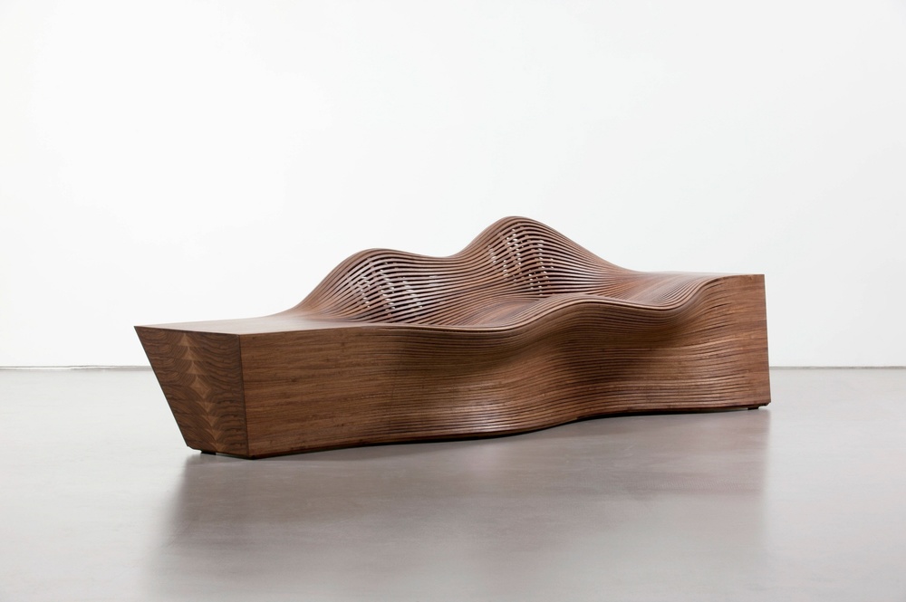 Steam-bent walnut furniture pieces by Bae Se Hwa.