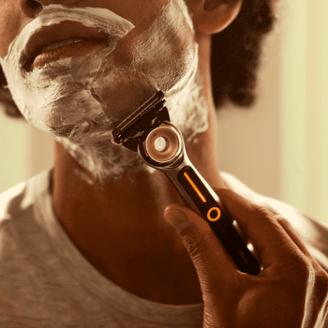 Man shaves using GilletteLabs' new Heated Razor.