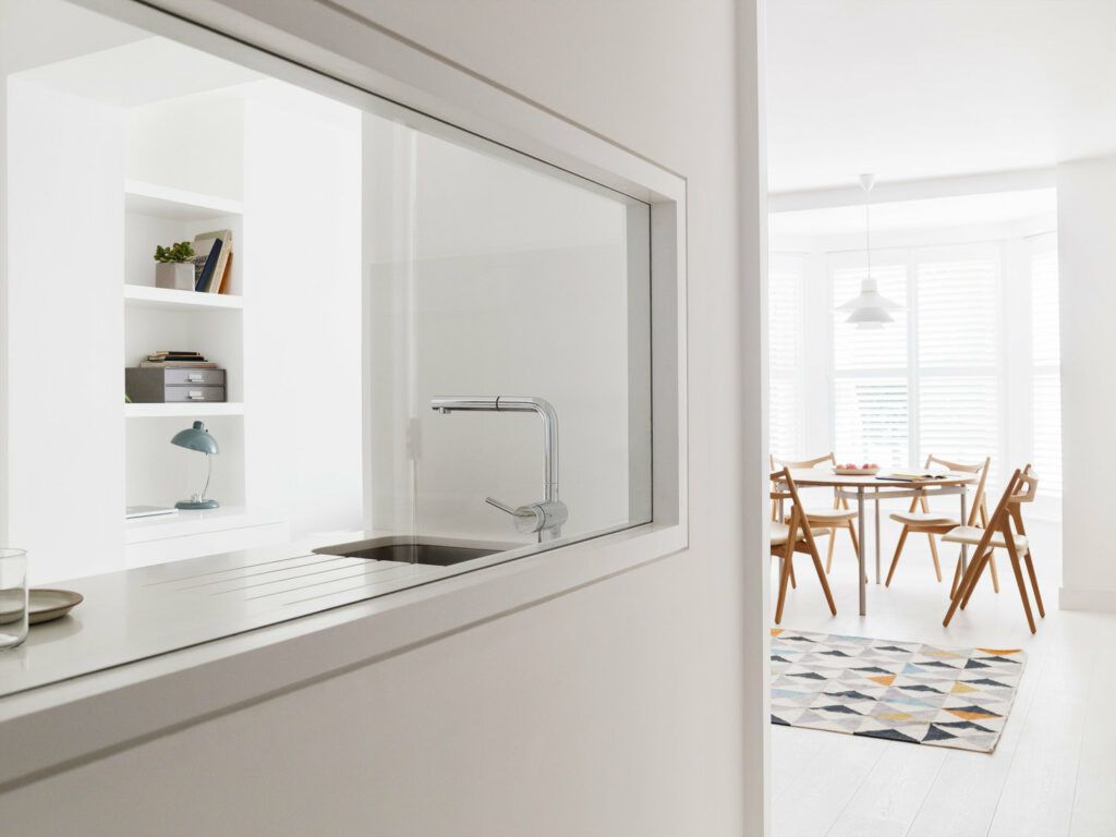 Pictures of a tiny Primose Hill apartment, with renovated interiors by  Amos Goldreich Architecture.